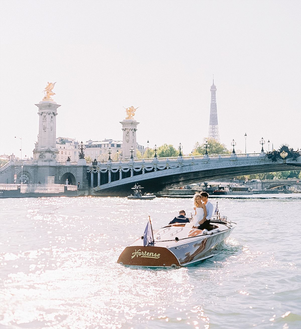 pre wedding photos for your engagement shoot in paris on a boat cruise on the Seine river by film photographer Audrey