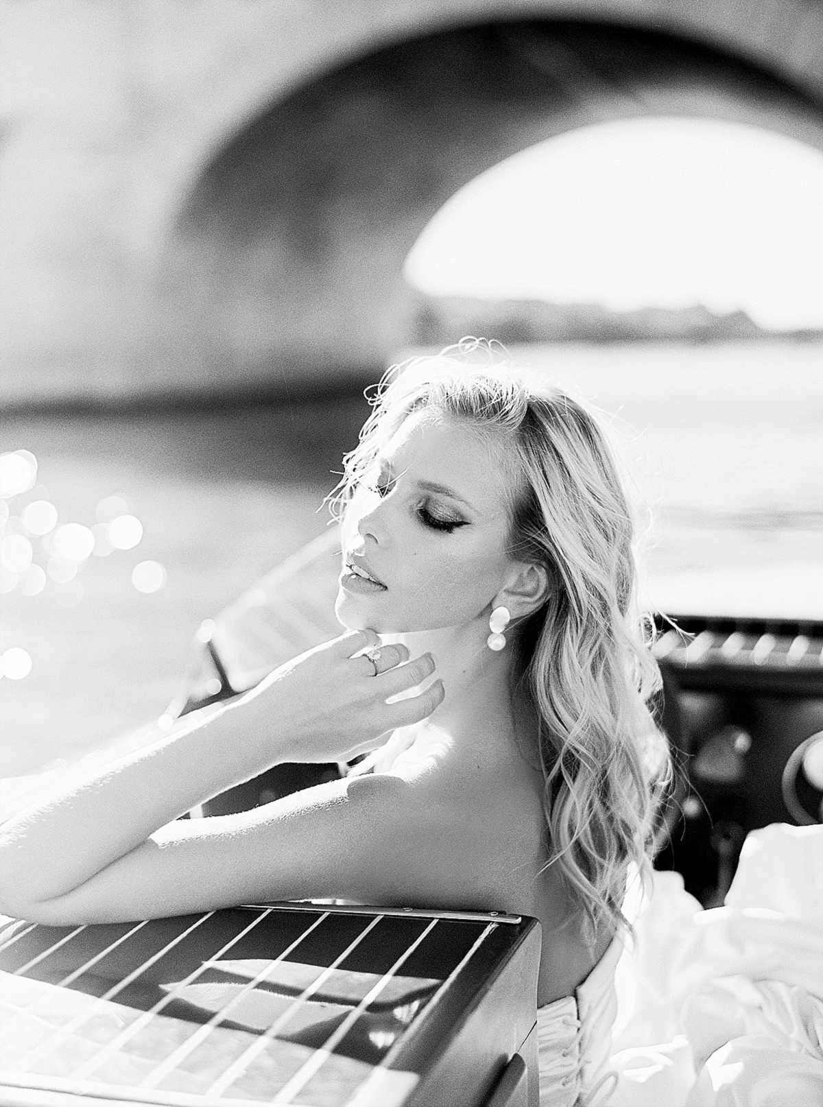 pre wedding photos for your engagement shoot in paris on a boat cruise on the Seine river by film photographer Audrey