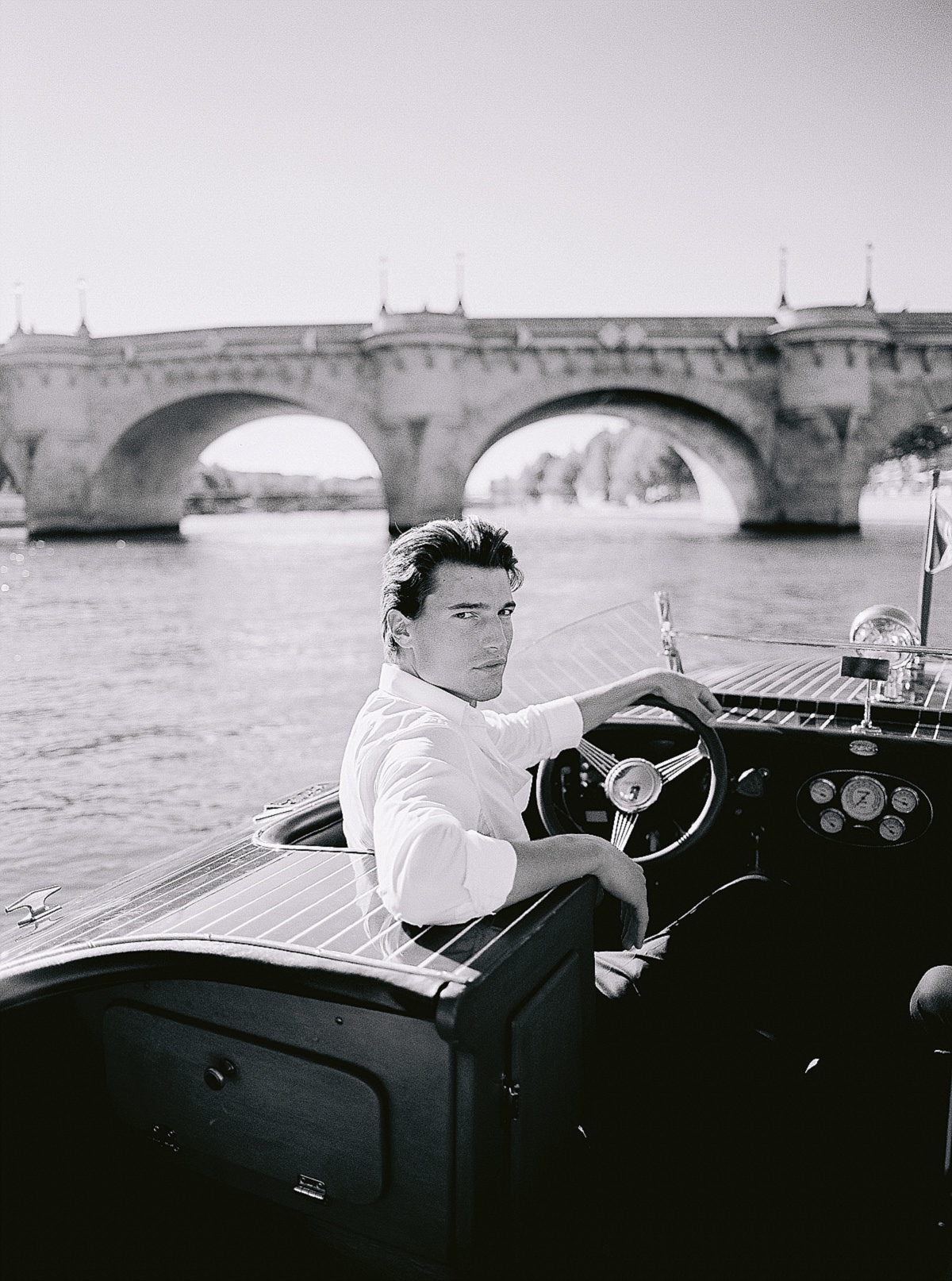 pre wedding photos for your engagement shoot in paris on a boat cruise on the Seine river by film photographer Audrey