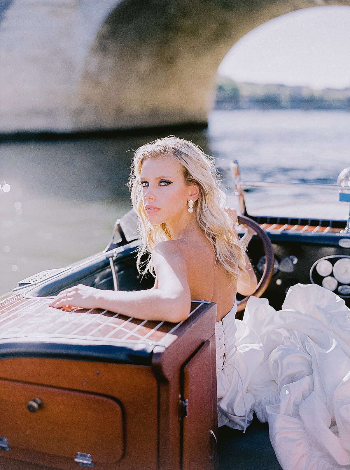 pre wedding photos for your engagement shoot in paris on a boat cruise on the Seine river by film photographer Audrey