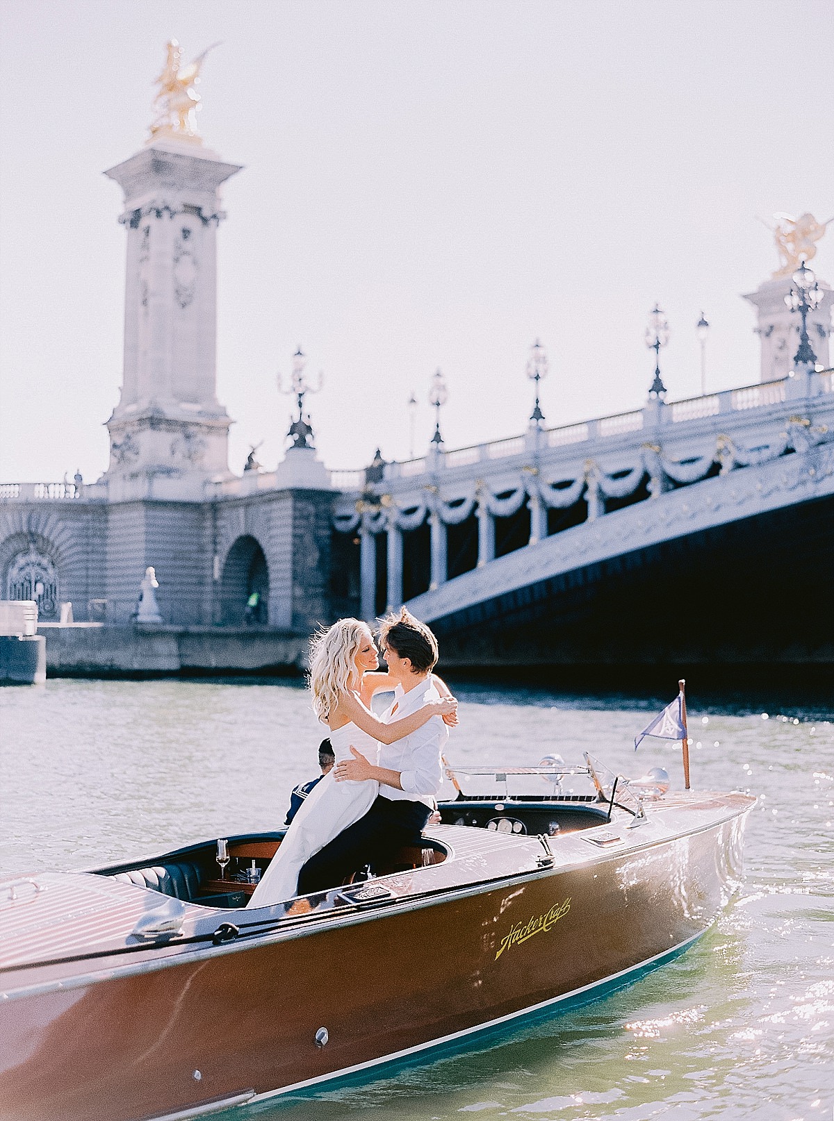 pre wedding photos for your engagement shoot in paris on a boat cruise on the Seine river by film photographer Audrey