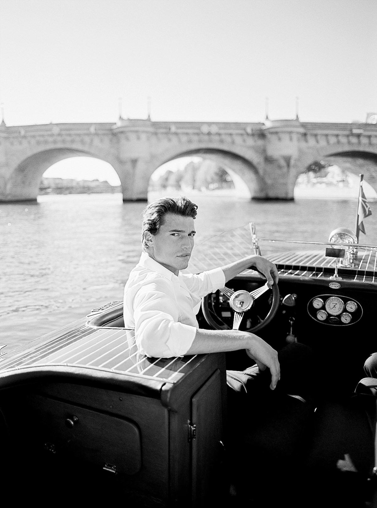 pre wedding photos for your engagement shoot in paris on a boat cruise on the Seine river by film photographer Audrey