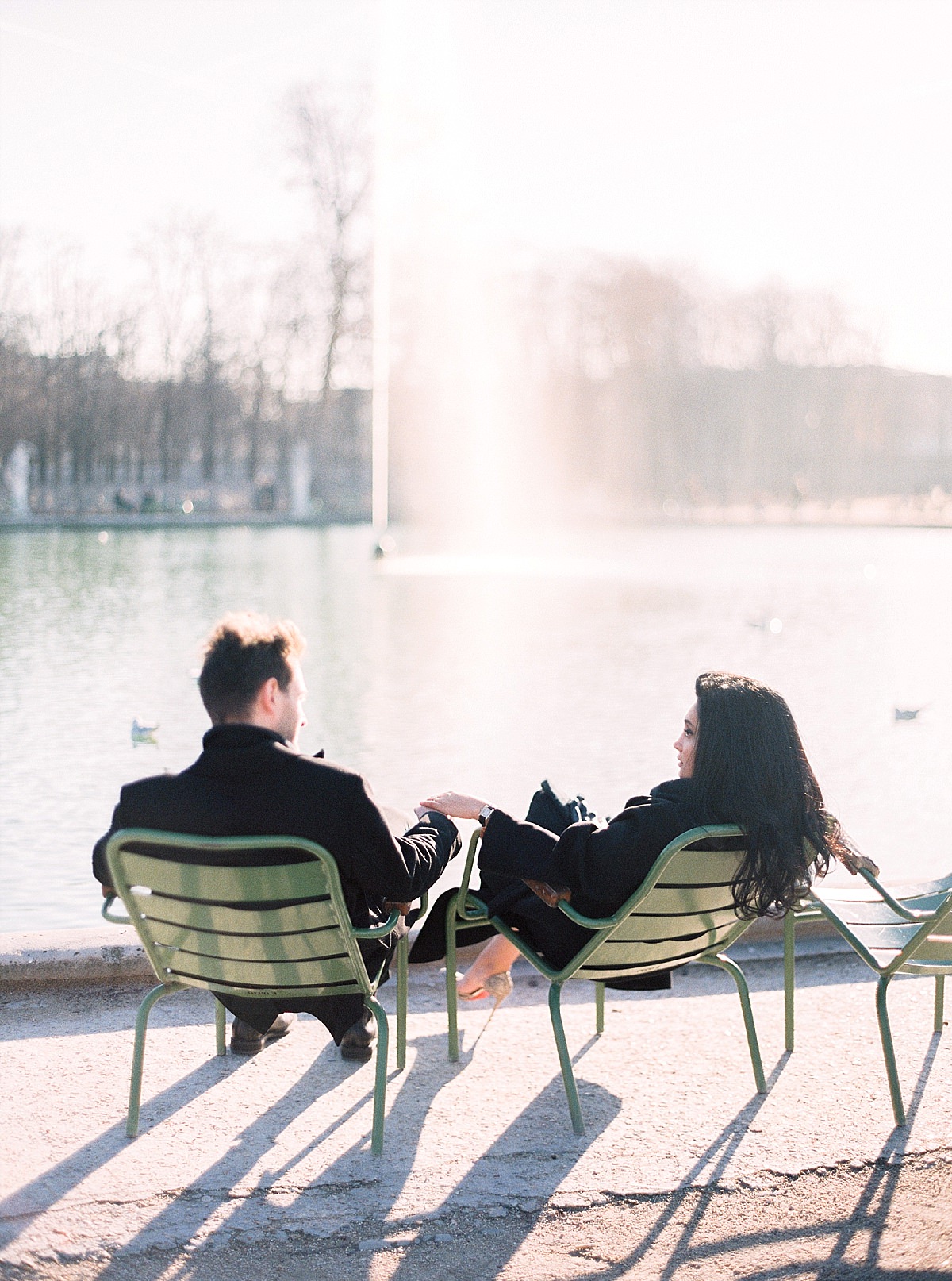 couple at the Tuilerie garden in Paris for their engagament shoot

