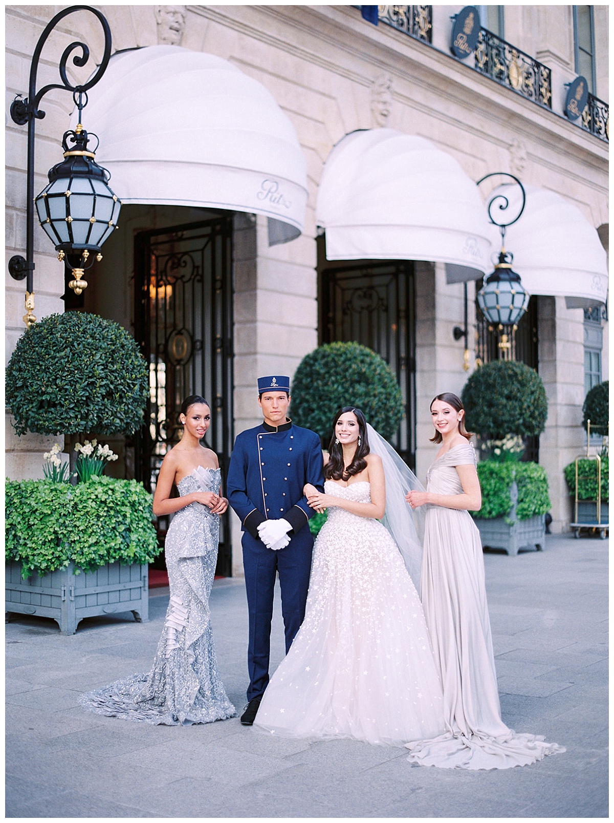 the buttler with the bride and her bridesmaids in front of the ritz 