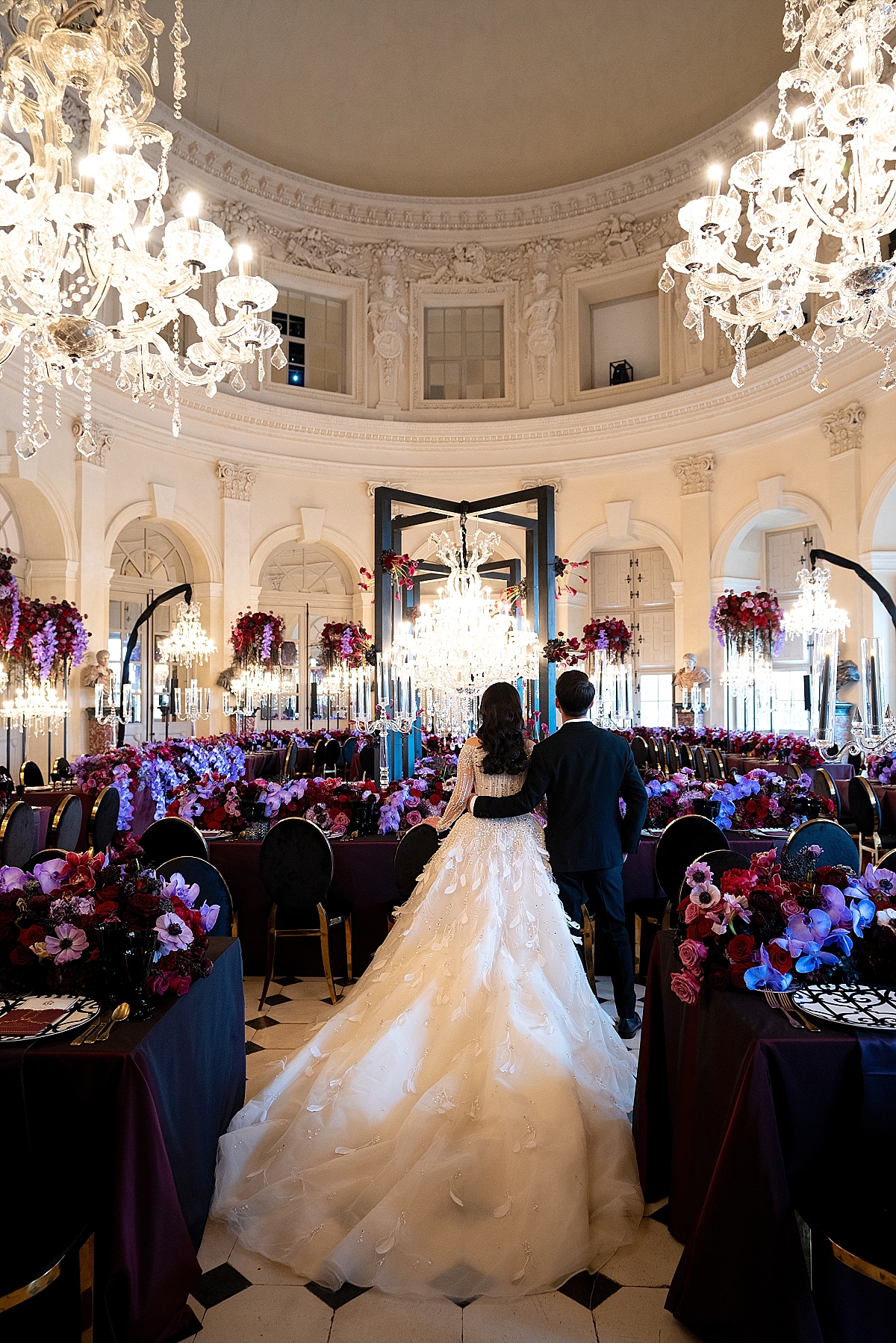 Valencia Tanoesoedibjo & Kevin Sanjaya in the reception room of their luxury wedding at Chateau de Vaux le Vicomte 