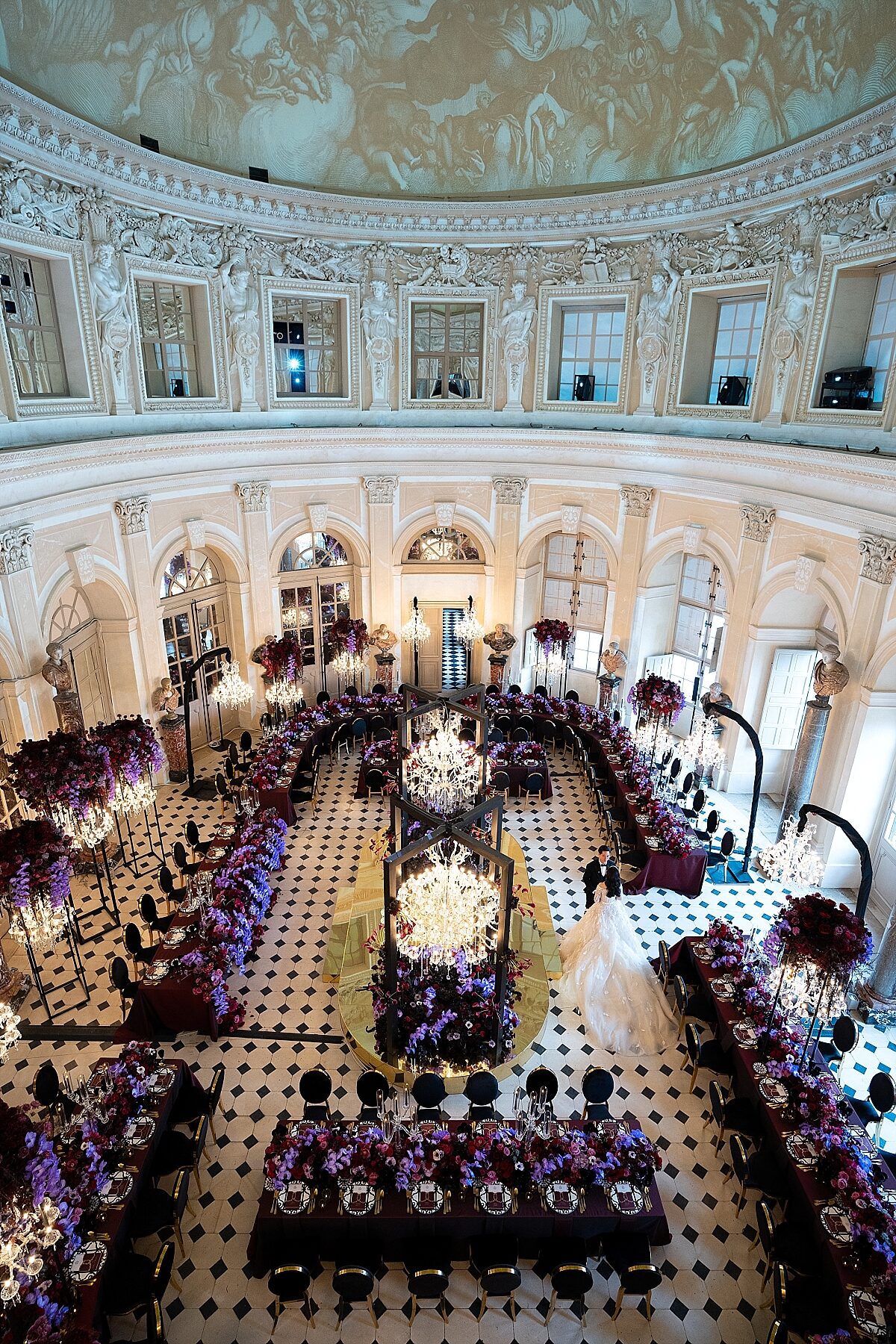 Valencia Tanoesoedibjo & Kevin Sanjaya in the reception room of their luxury wedding at Chateau de Vaux le Vicomte 